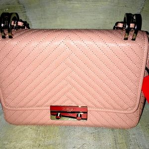 Carolina Herrera , blush pink double strap or crossbody bag